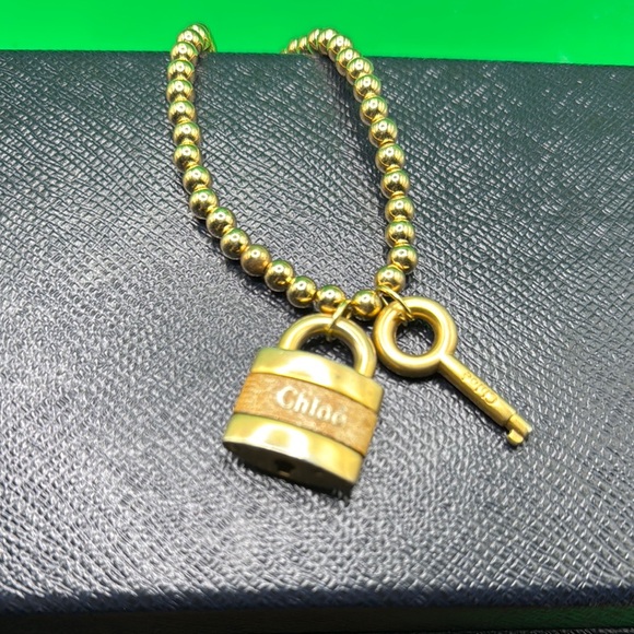 Chloé Gold Beaded Bracelet with Lock and Key Charm - Picture 1 of 5